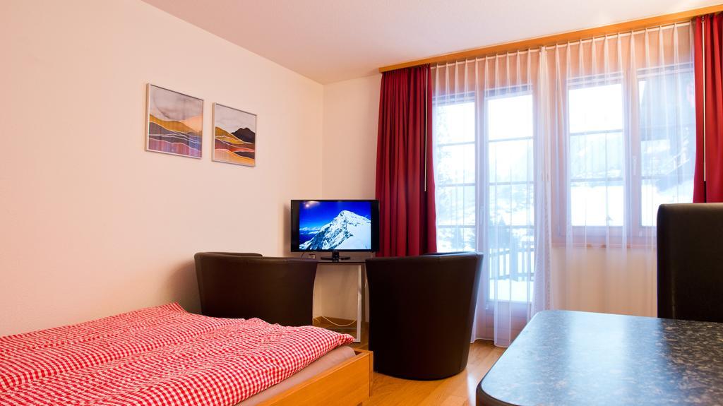 Mom - Alpine Boutique Apartments, Chalet Fagus, Terrace Studio Гриндельвальд Номер фото